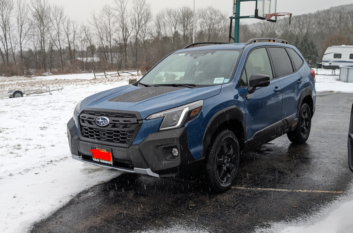 New Forester Wilderness parked on a blacktop driveway