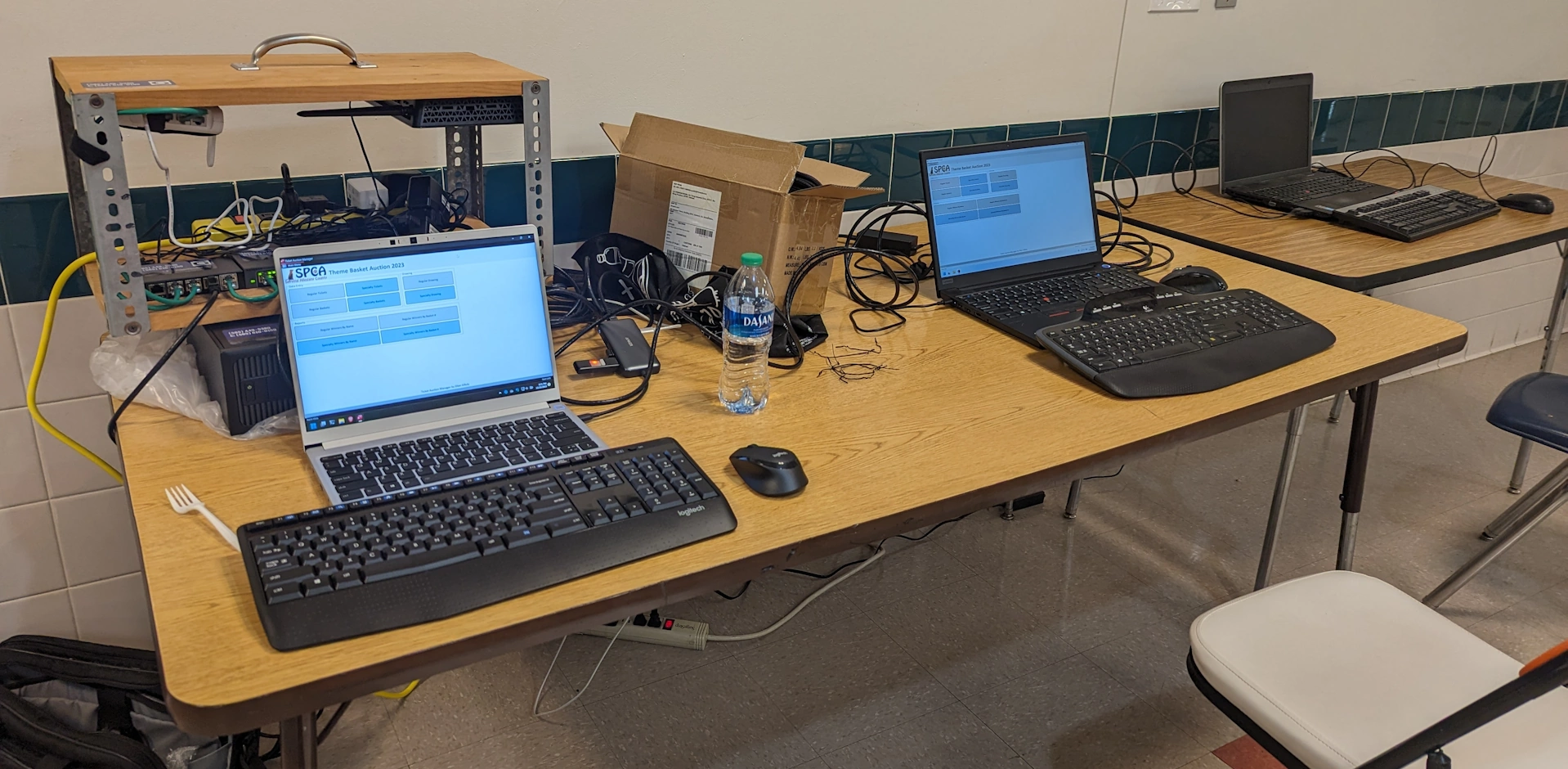 3 laptops setup for SPCA Theme Basket Auction 2023
